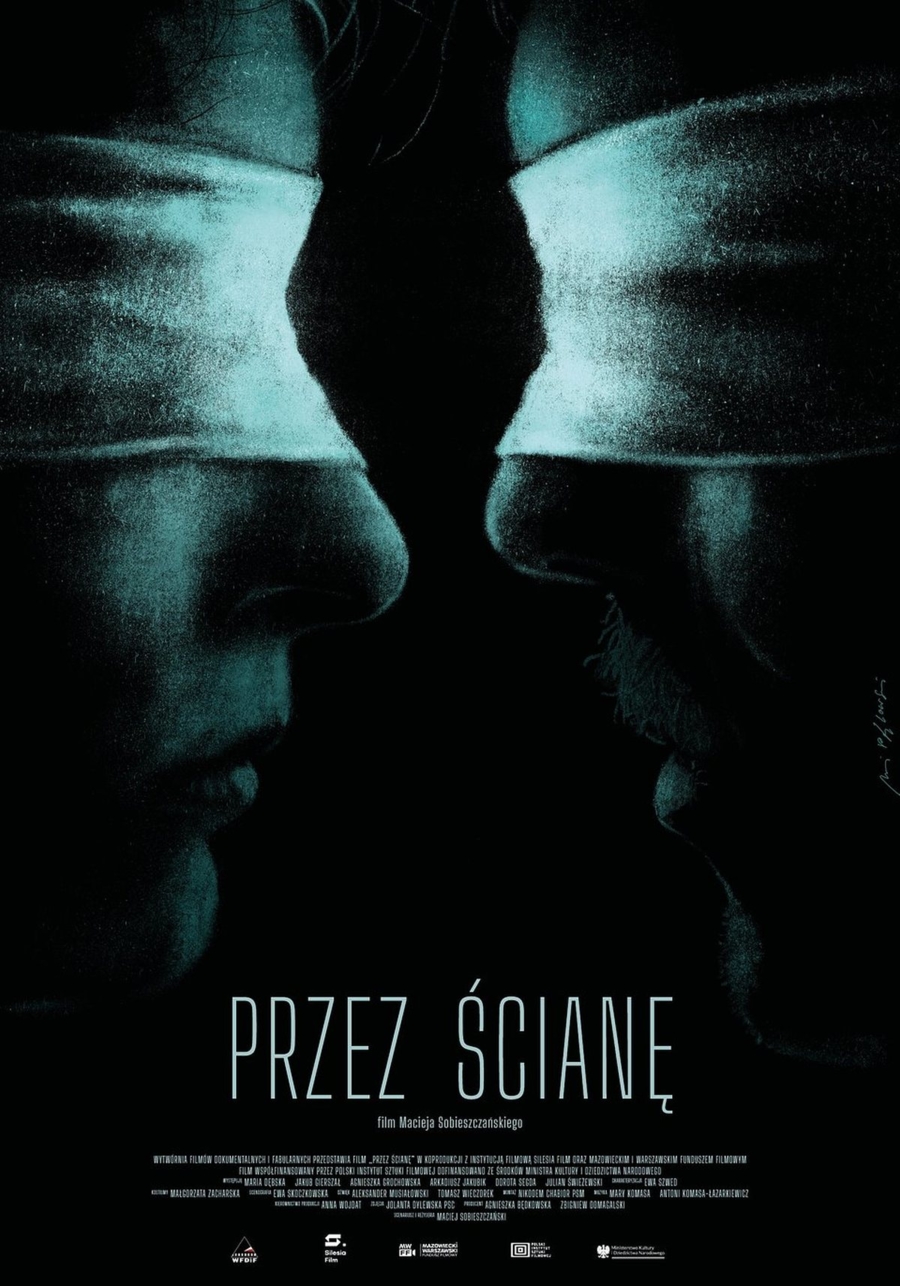 Plakat filmu "Przez ścianę"